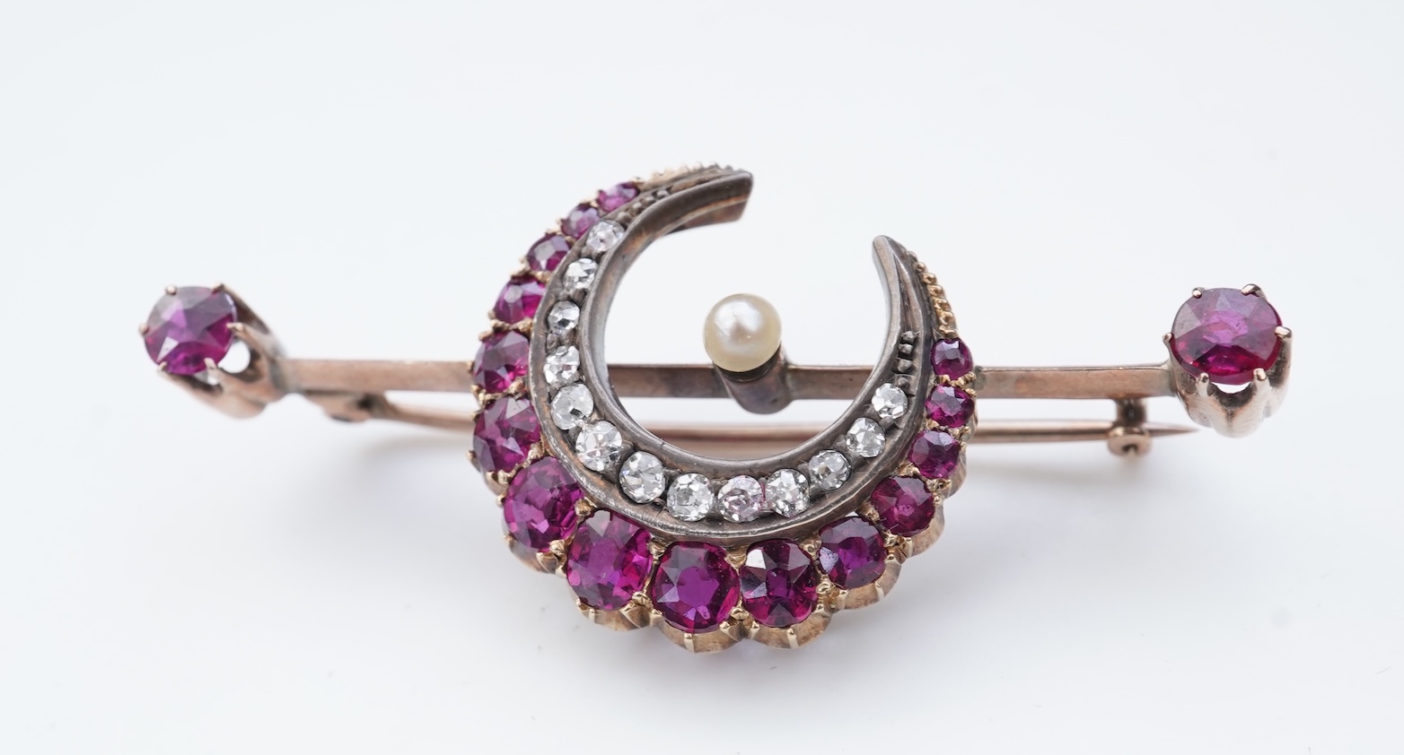 A Victorian ruby and diamond bar brooch, late 19th century